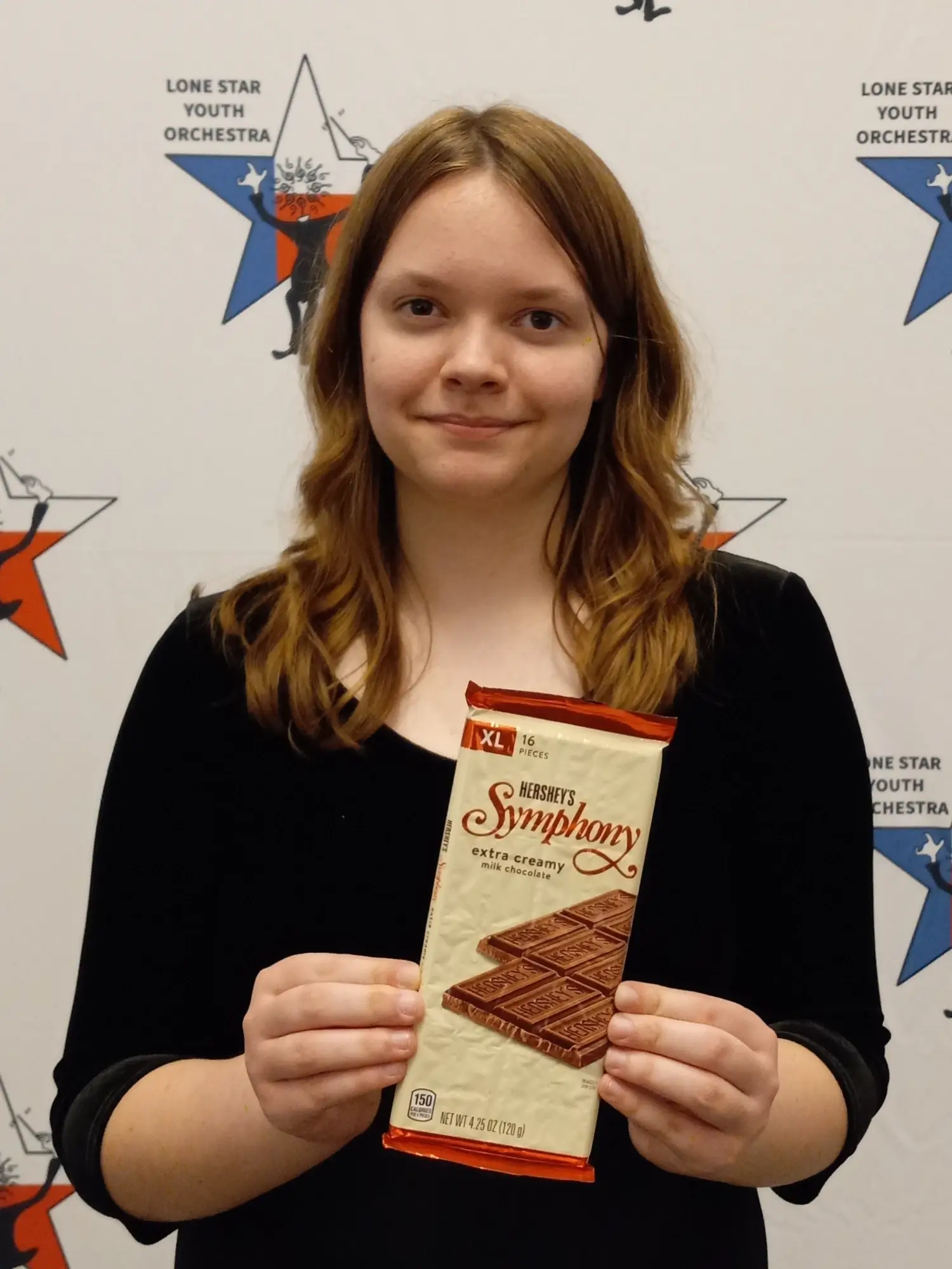 11-6-2024 - 34a - Sarah (holding Hershey's Symphony chocolate bar 4th place prize) CROPPED