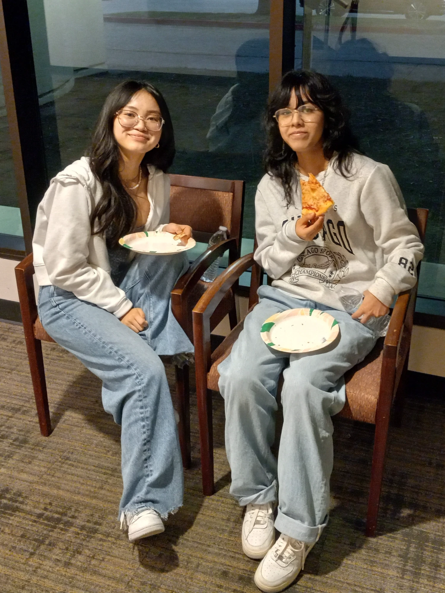 9-18-2024 - Sectionals photo 41 - Two girls on bench during the pizza break (BETTER, cropped)